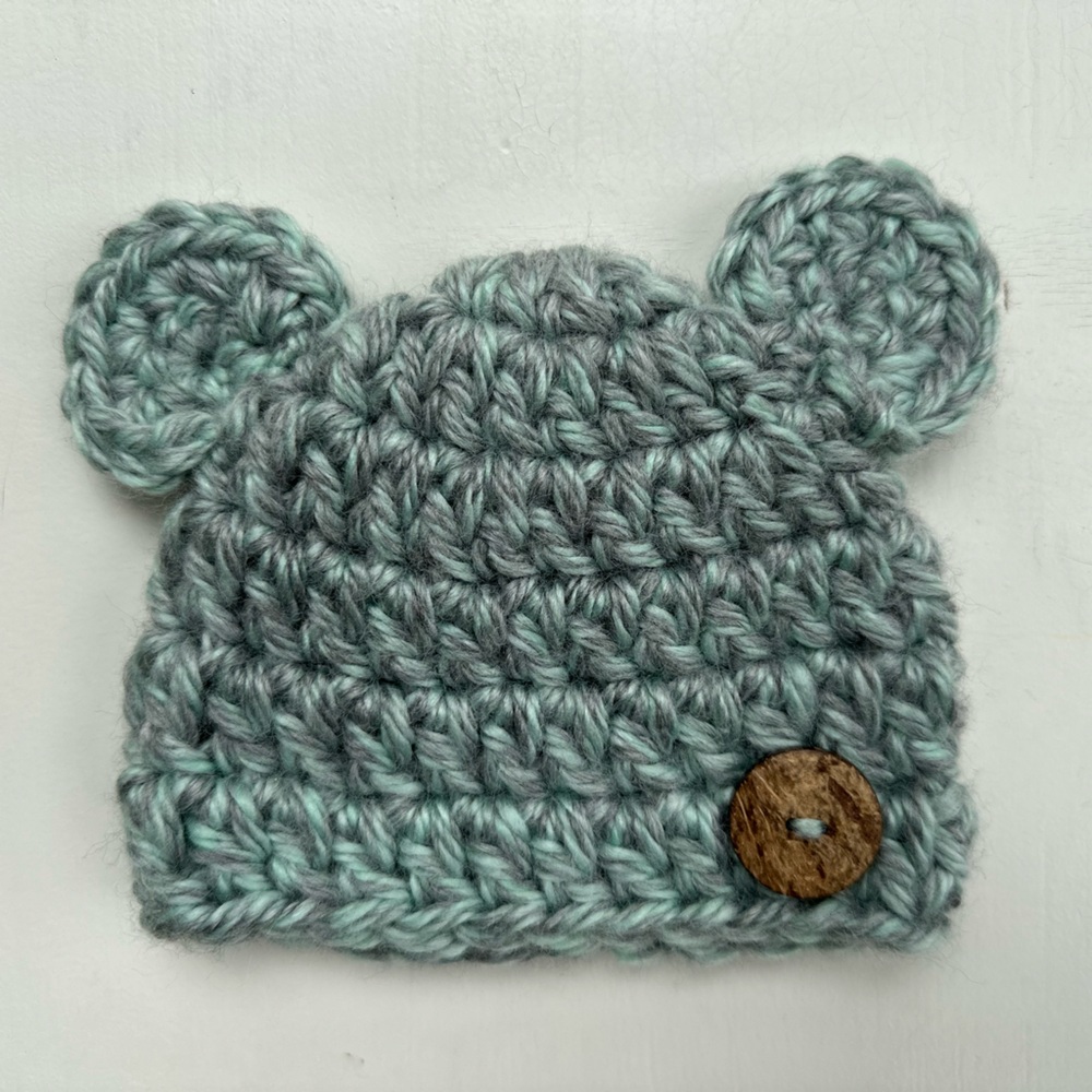 Hand knit newborn hat.